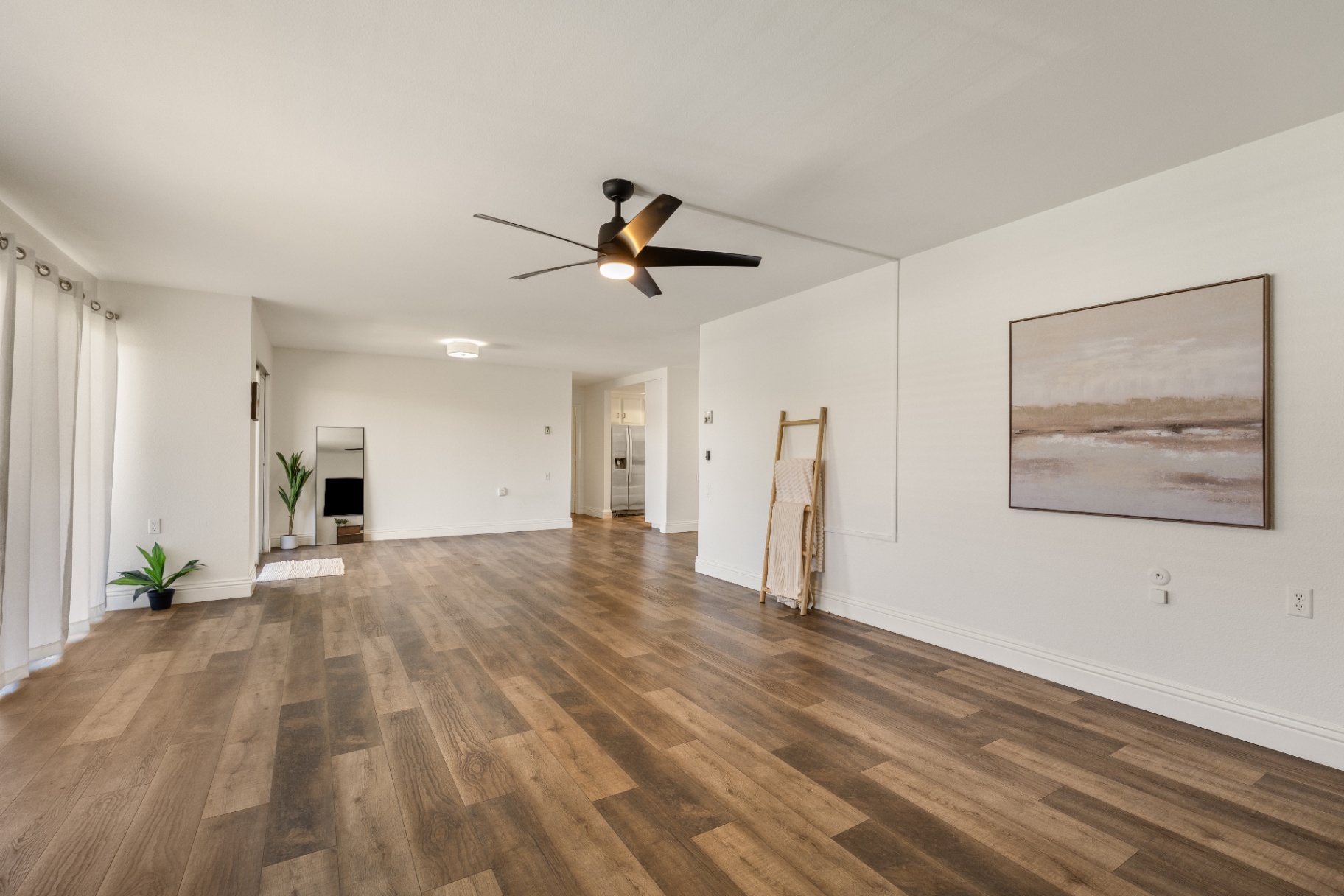 Open living area looking toward the kitchen entrance