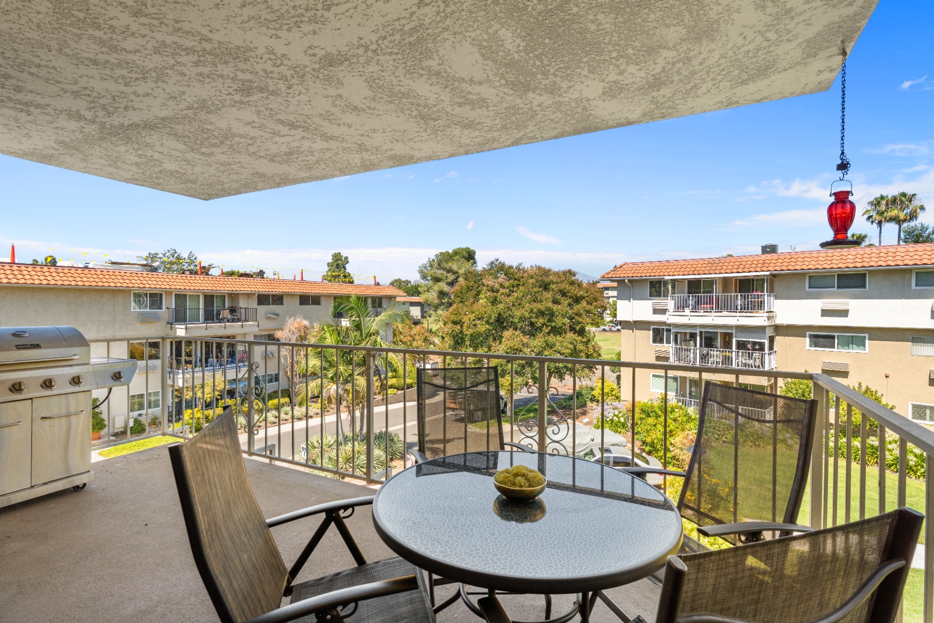 Balcony view with BBQ grill and open sky
