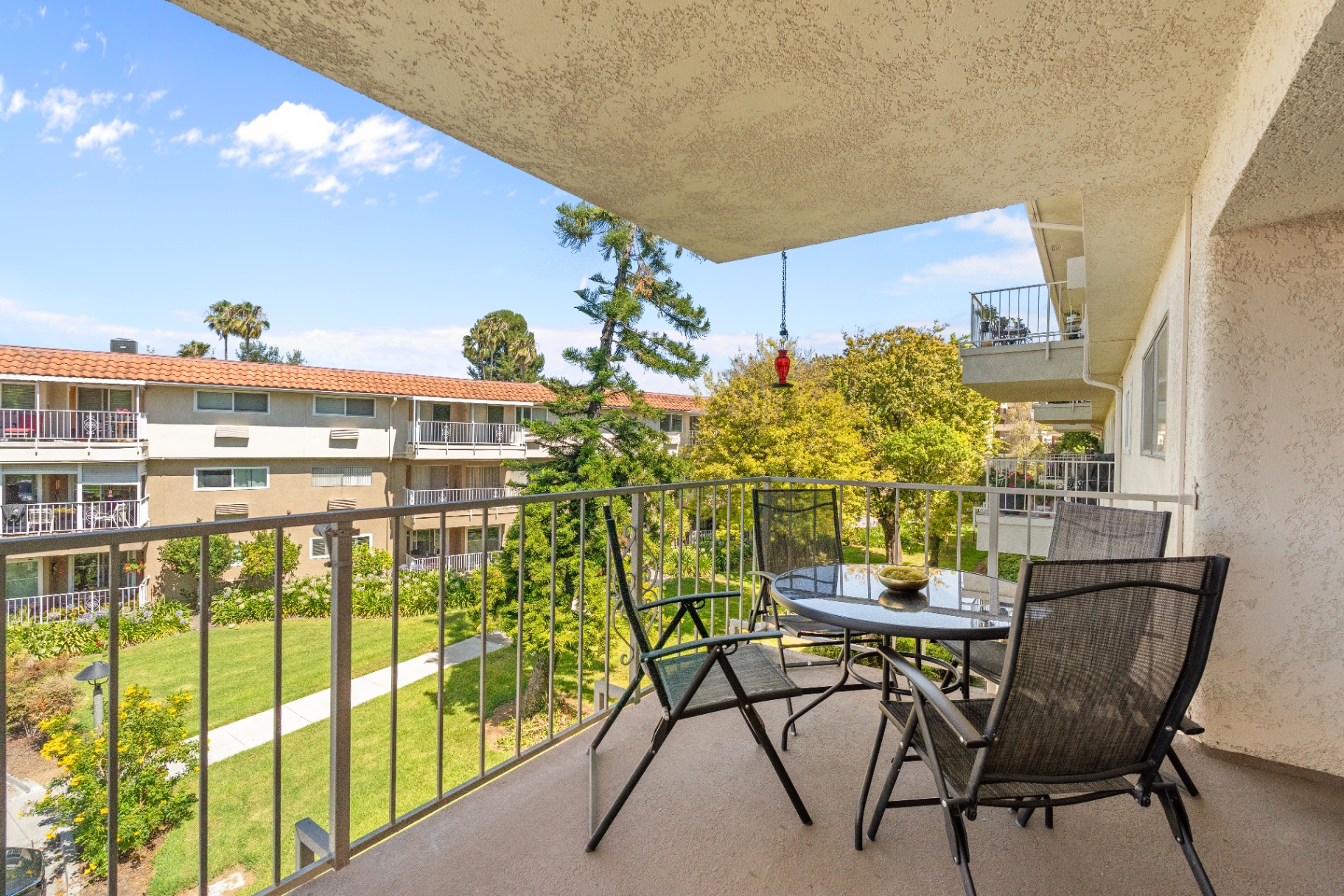 Private balcony overlooking landscaped grounds