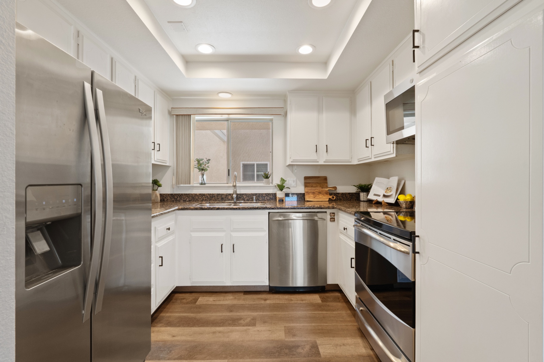 Kitchen with stainless appliances and granite counters