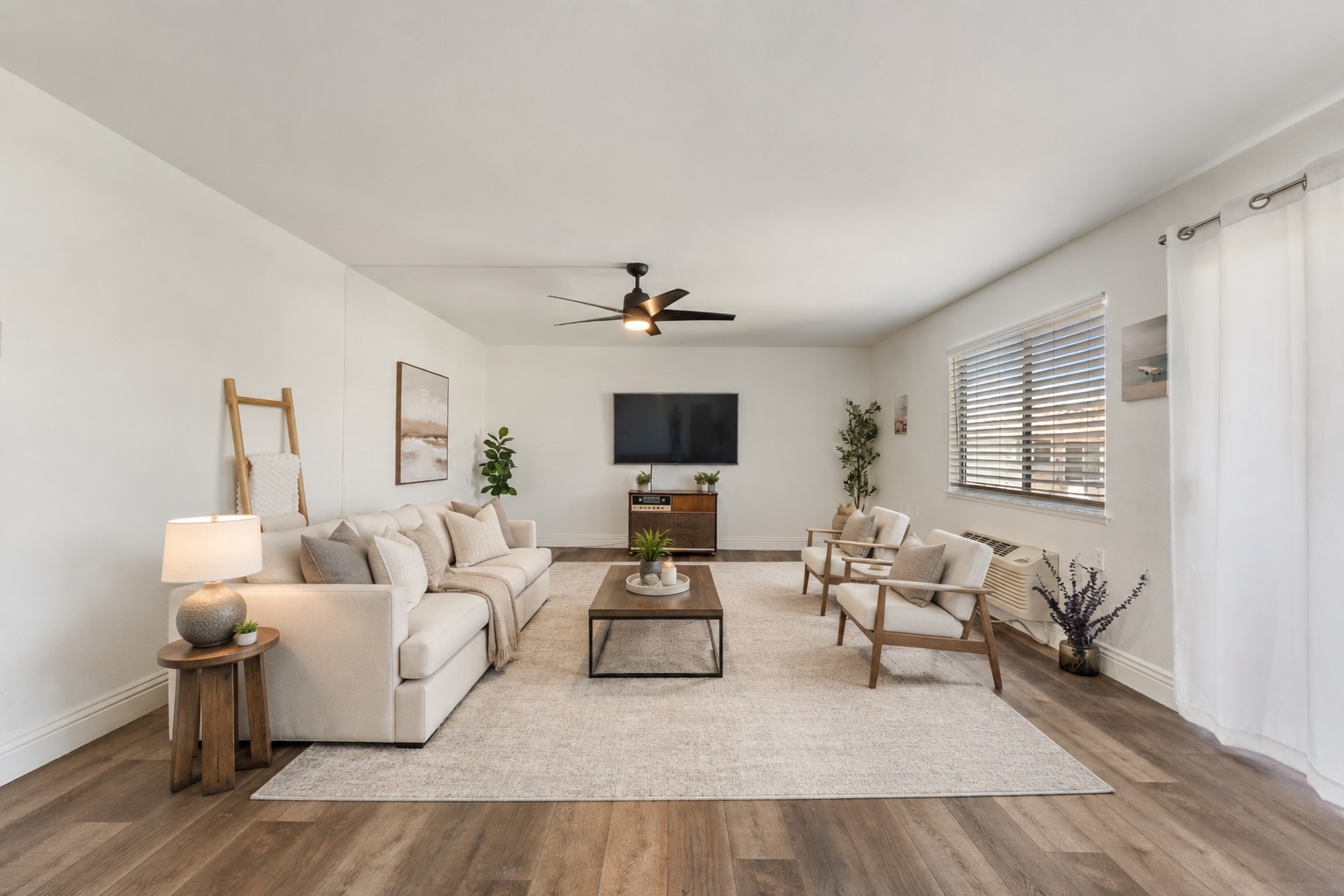 Virtually staged living room at 2389 Via Mariposa W #2A