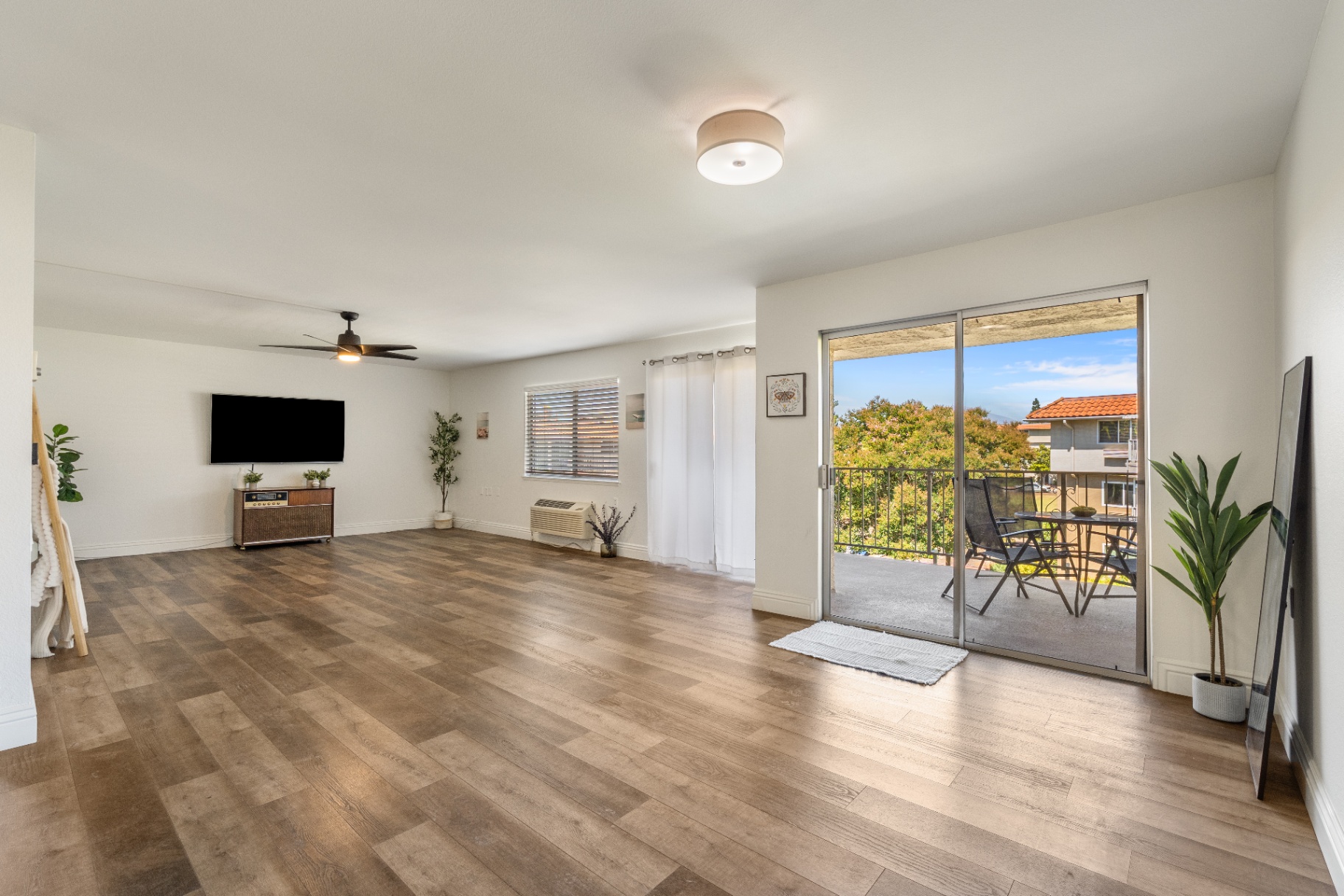 Living room with sliding door to private balcony