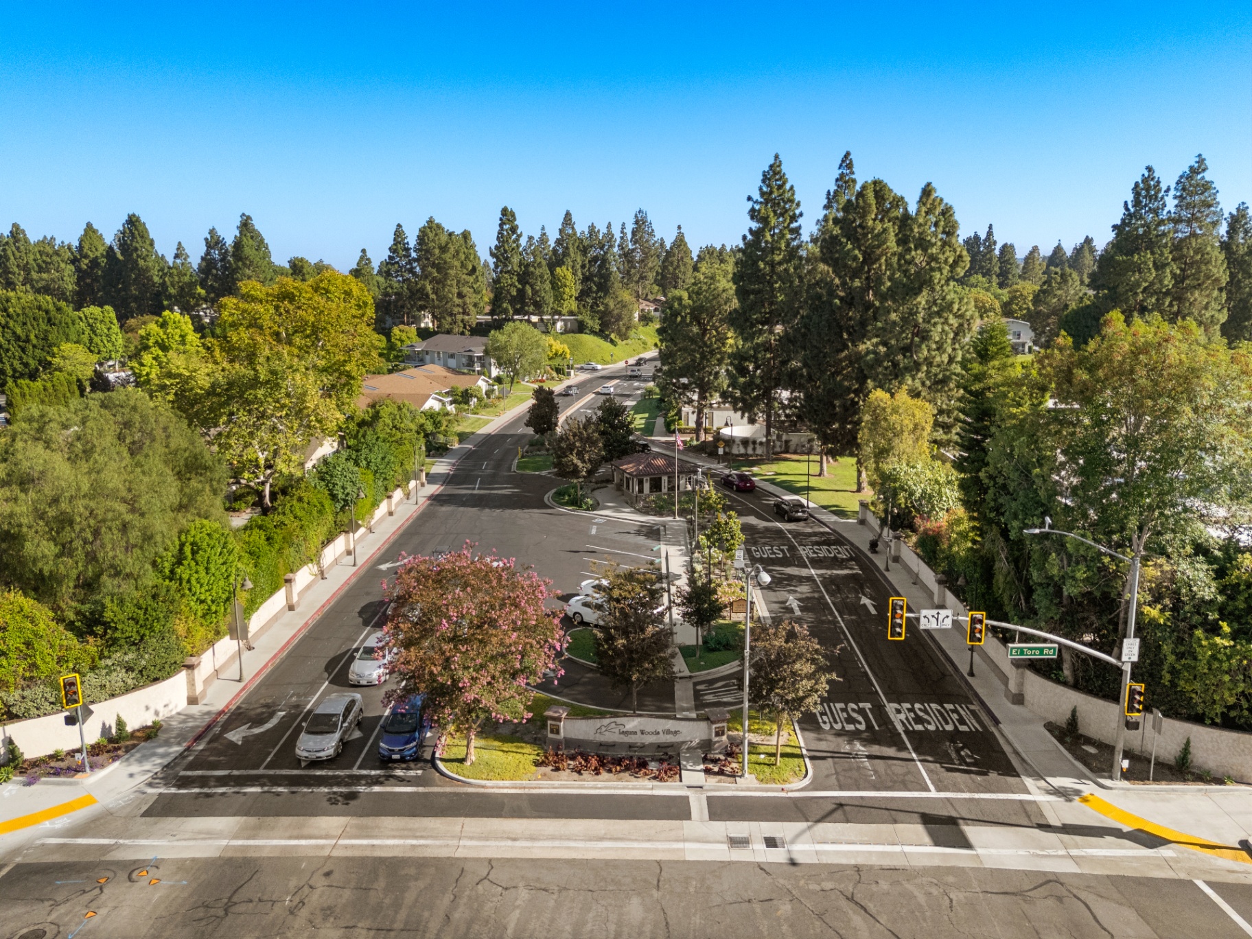 Closer aerial view of the gated community entrance at El Toro Road