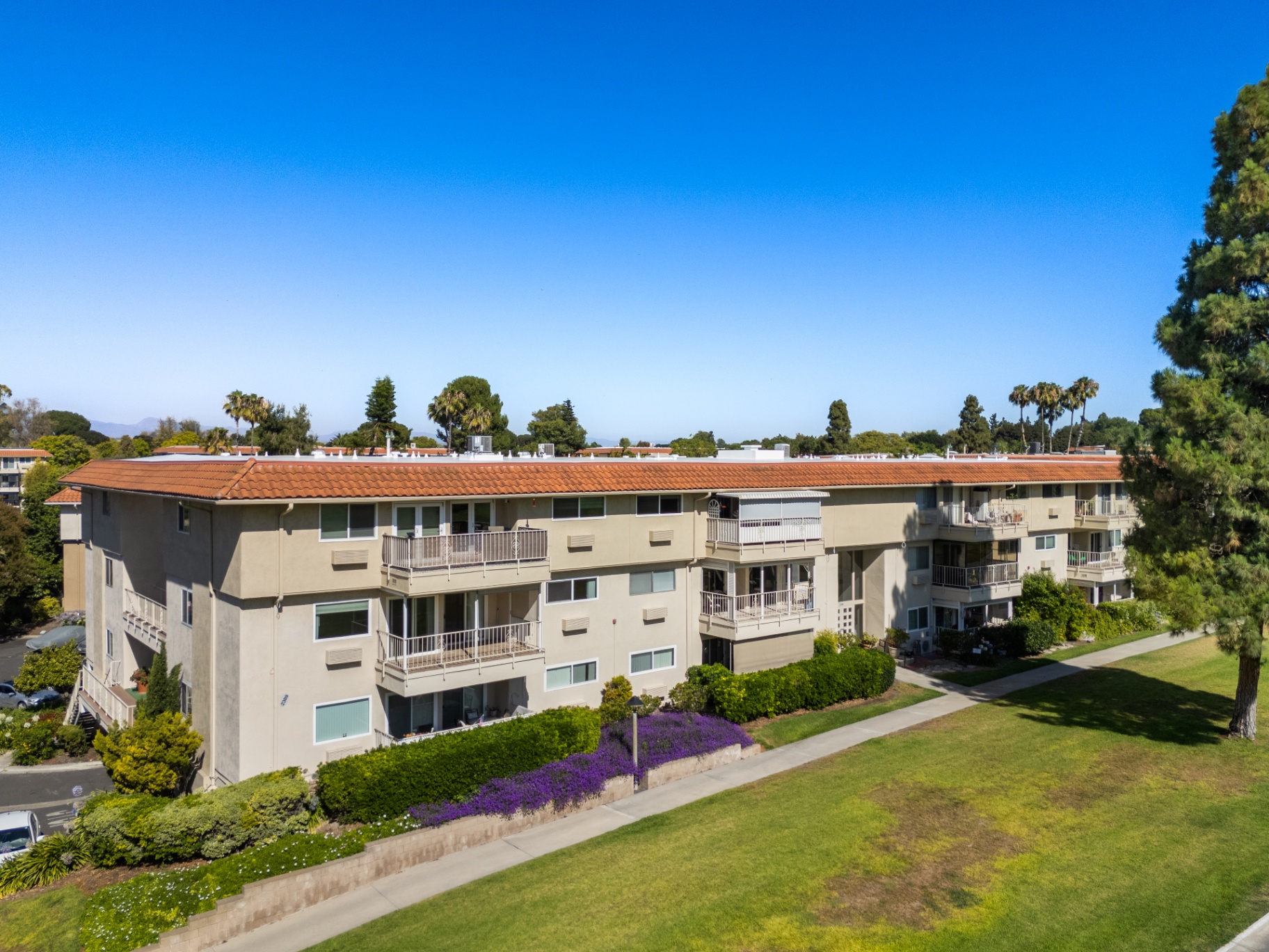 Aerial front exterior of the 2389 Via Mariposa W building