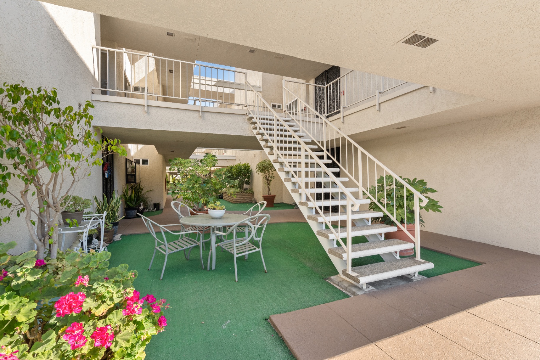 Interior courtyard with stairs and seating area
